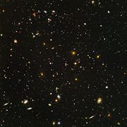 The Hubble Ultra Deep Field showcases galaxies from an ancient era when the universe was younger, denser, and warmer according to the Big Bang theory.