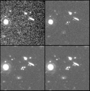 A section of the HDF about 14 arcseconds across in each of the four wavelengths used to construct the final version: 300 nm (top left), 450 nm (top right), 606 nm (bottom left) and 814 nm (bottom right)