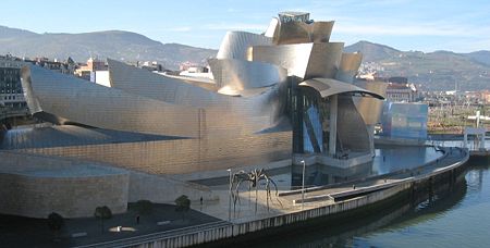 The Guggenheim Museum Bilbao by Frank Gehry, on the Nervi&oacute;n River in downtown Bilbao, Spain.