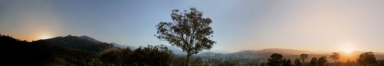 A digital composite of several panoramas of the same location on the same day show the passing time - on the northern hemisphere, on the left is west and sunset, on the right is east and dawn
