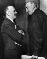 John Maynard Keynes and Harry Dexter White at the Bretton Woods Conference &ndash; Both economists been strong advocates of a liberal international trade environment, and recommended the establishment of three institutions: the IMF (fiscal and monetary issues), the World Bank (financial and structural issues), and the ITO (international economic cooperation).