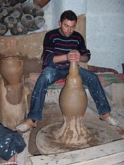 Shaping on a potter's kick wheel; G&uuml;lşehir, Turkey