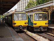 Two British Rail Class 143 DMUs at Cardiff Queen Street station in the United Kingdom