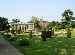 The "Italian garden", Orangery and Church. The Orangery and "Italian garden" were designed by Jeffry Wyatville in the early 19th century. The church contains the tombs of the Brownlow and Cust owners of Belton House.