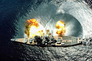 USS&nbsp;Iowa fires a full broadside of nine 16&nbsp;inch (406&nbsp;mm) / 50-caliber and six 5&nbsp;inch (127&nbsp;mm) / 38-caliber guns during a target exercise. Note concussion effects on the water surface, and 16&nbsp;inch (406&nbsp;mm) gun barrels in varying degrees of elevation.