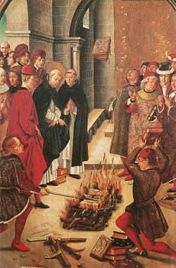 An image frequently misinterpreted as the Spanish Inquisition burning prohibited books. This is actually Pedro Berruguete's La Prueba del Fuego (1400s). It depicts a legend of St Dominic's dispute with the Cathars: they both consign their writings into the flames, and while the Cathars' text burn, St Dominic's miraculously leaps from the flames.
