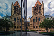 Trinity Church reflected in the fa&ccedil;ade of the John Hancock Tower.