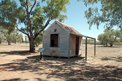 Primitive heritage mosque in Australian outback contrasts with the grand designs of established Islamic communities. Bourke cemetery, New South Wales