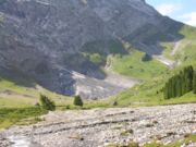 The beginning of a mountain river in the Swiss Alps (Reichenbach in Grosse Scheidegg)