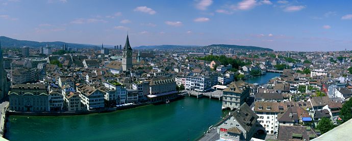 View on Zurich from the Grossm&uuml;nster church. Shows the river as well as St. Peter's Church.