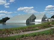 A modern greenhouse in Wisley Garden, England, made from float glass