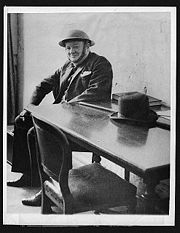 Churchill wears a helmet during an air raid warning in the Battle for Britain in 1940