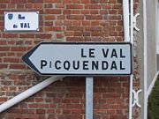 A streetsign in Merck-Saint-Li&eacute;vin, Pas-de-Calais, showing Germanic influence in local toponyms. The name Picquendal corresponds to the modern Dutch Pikkendal.